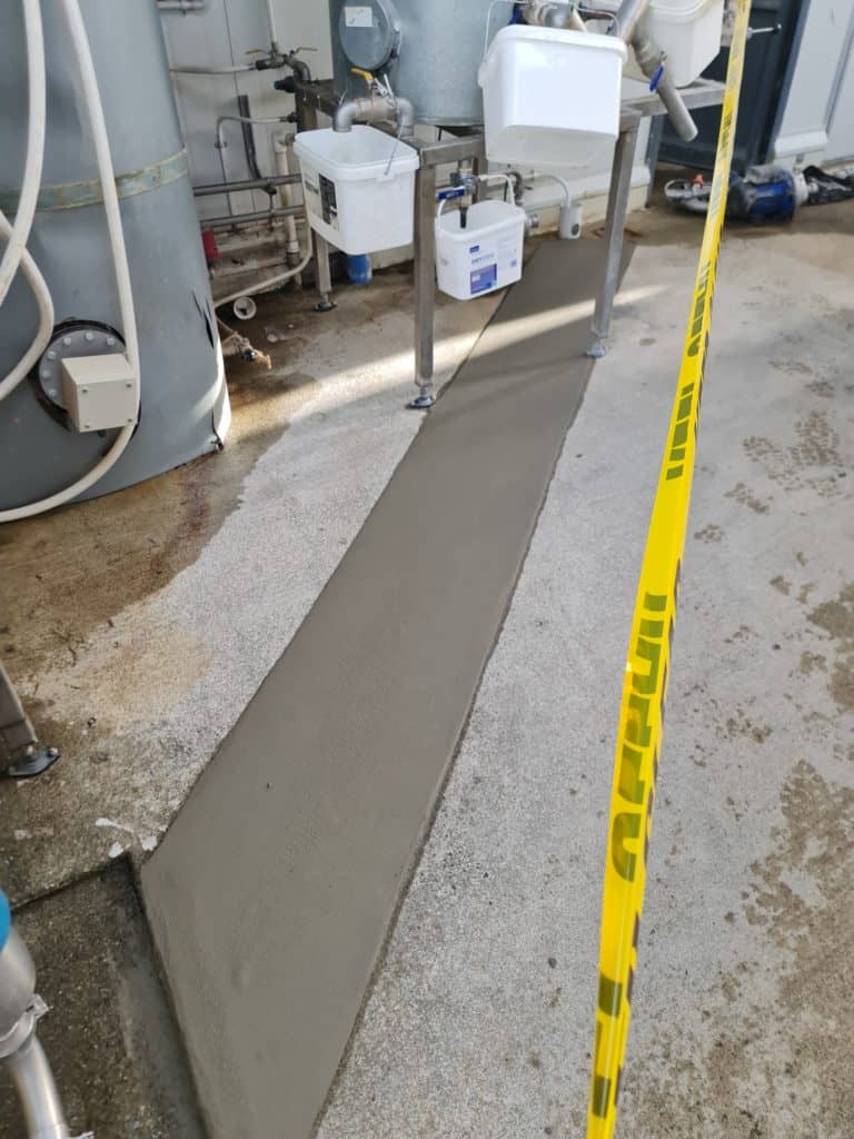 Pitted Concrete in shed repaired